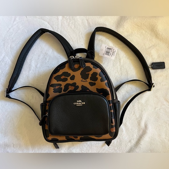 Coach Handbags - COACH Mini Court Backpack In Signature Canvas With Leopard Print
